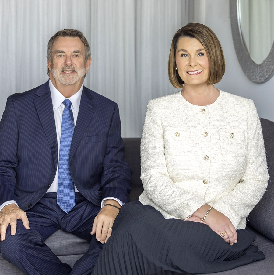 Stephen J. Naylor and Kimberly M. Naylor seated together in formal attire