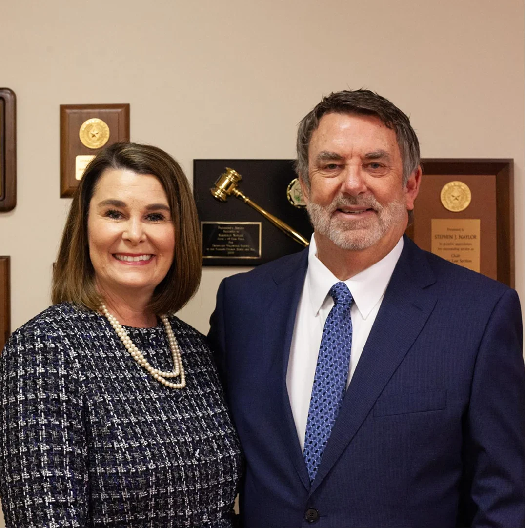 Stephen J. Naylor and Kimberly M. Naylor standing together in formal attire